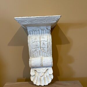 Carved wood corbel shelf